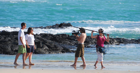 Students filming a documentary on the beach in the Galapagos.